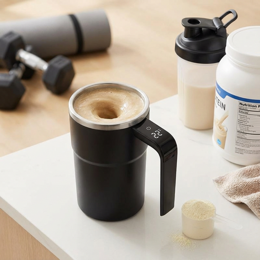 Black coffee maker with digital display on a kitchen counter with fitness equipment in the background