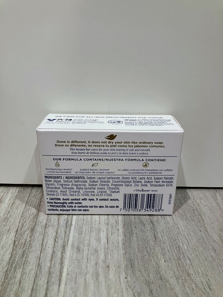Back of a soap packaging box on a wooden surface with a white background