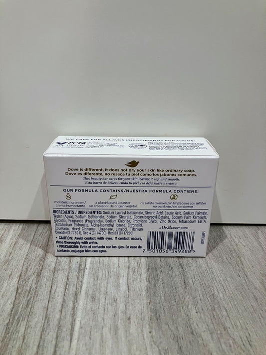 Back of a soap packaging box on a wooden surface with a white background